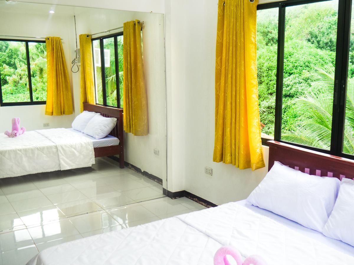 Luna Oslob Travellers Inn Exterior photo
